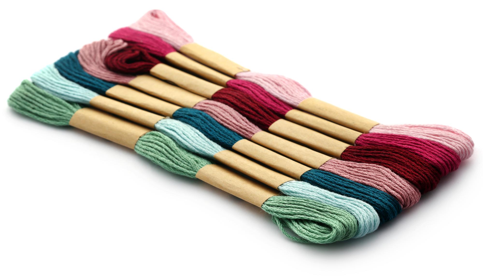 Stacked skeins of embroidery thread